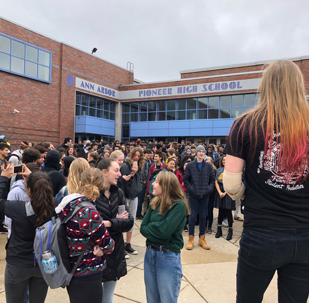 Emma Roth, right, helped lead the student walkout Feb. 21.