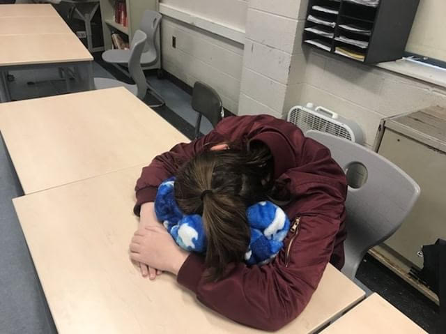 Pioneer junior, Miya Restorick, attempting to sleep in her U.S. Government class.