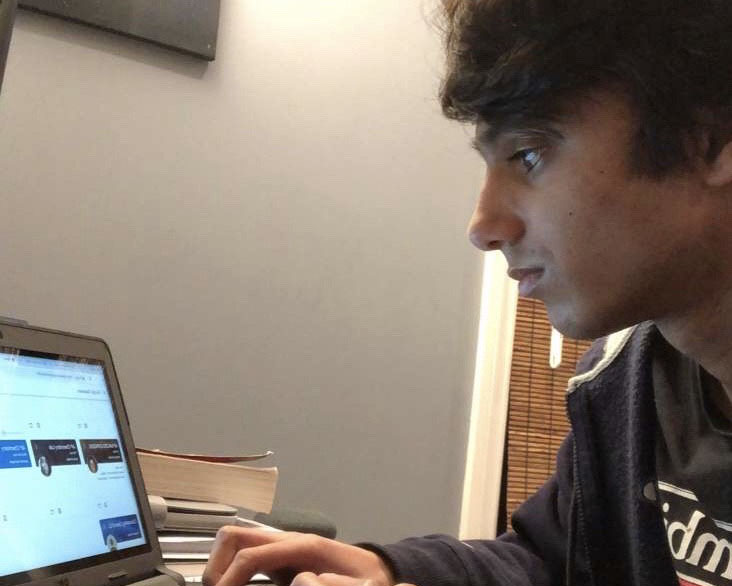 Pioneer junior Shailen Chugh uses his computer to both complete online schooling and stay in touch with friends during the COVID stay-at-home order.