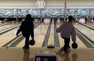 Pioneer senior, Lai'la Wilborn, and Skyline Freshmen, Grace Omar, are throwing the strikes and spares together.